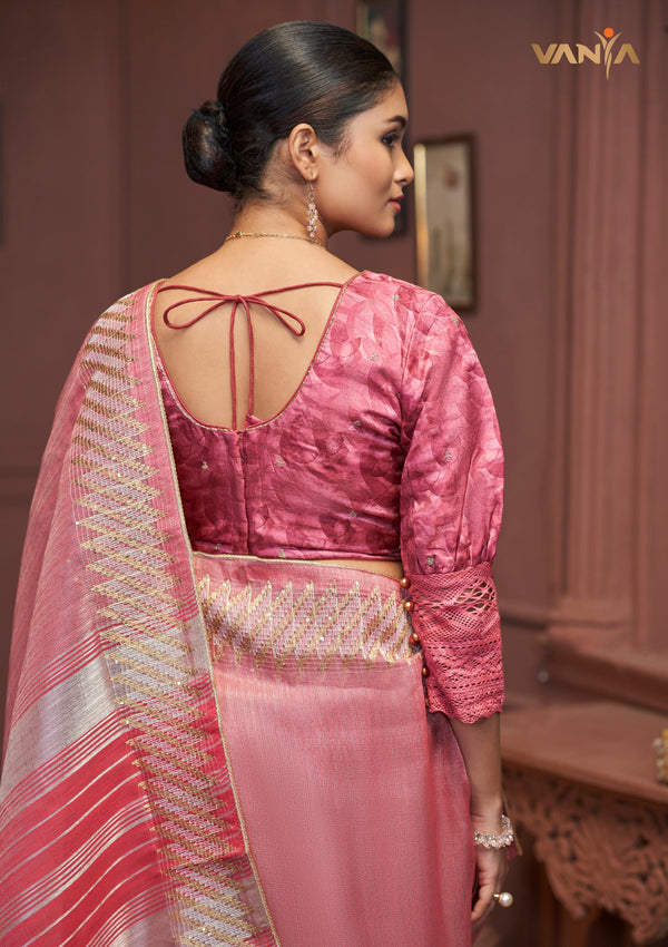 The elegant back view of the Vanya Sarees designer blouse, showing the puff sleeves, lace cuffs, and dori tie-up.
