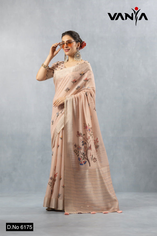 A full-length view of the model in Vanya Sarees' chic blush pink striped linen saree with an artistic bird print.