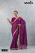 A full-length view of the model in Vanya Sarees' regal magenta purple Bandhani georgette saree with a heavy embroidered border.