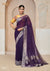 A full-length view of the model in Vanya Sarees' magnificent royal purple georgette saree with a heavy silver Banarasi border.