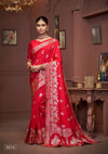 A full-length view of the model in Vanya Sarees' magnificent red and gold bridal Katan Banarasi silk saree.