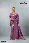 Official catalogue image for Vanya Sarees (D.No 7262) featuring a model in a stunning mauve purple tissue silk designer saree.