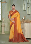 A full-length view of the model in Vanya Sarees' stunning yellow and rust ombre shimmer georgette saree with a designer blouse.