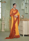 An elegant standing pose of the model showcasing the complete designer look of the Vanya Sarees yellow ombre saree and Patola print blouse.